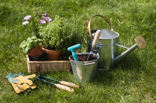 Close-up of safety helmet and gloves on a gardening cart