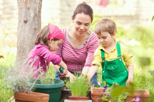 Garden scene with staff evaluating plants